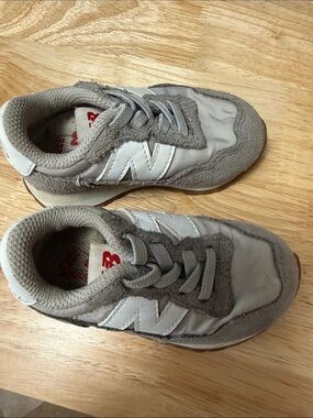 New Balance Kids Gray and White Sneakers